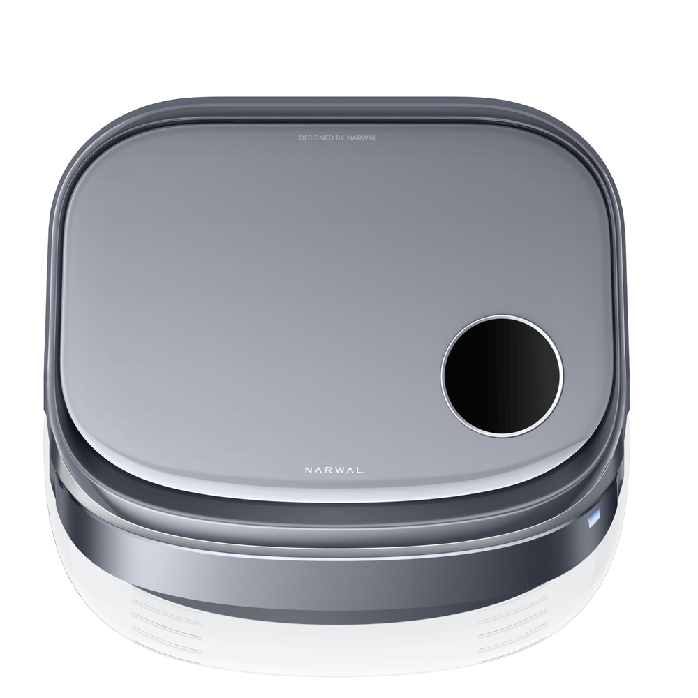 Top close-up of Narwal Freo Z10 Ultra robot vacuum and mop showing surface and sensor detail.