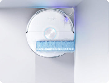Narwal Flow robot vacuum and mop cleaning deep into a corner with precise edge coverage.