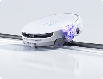 Narwal Flow Robotic vacuum cleaner cleaning a surface with a white background